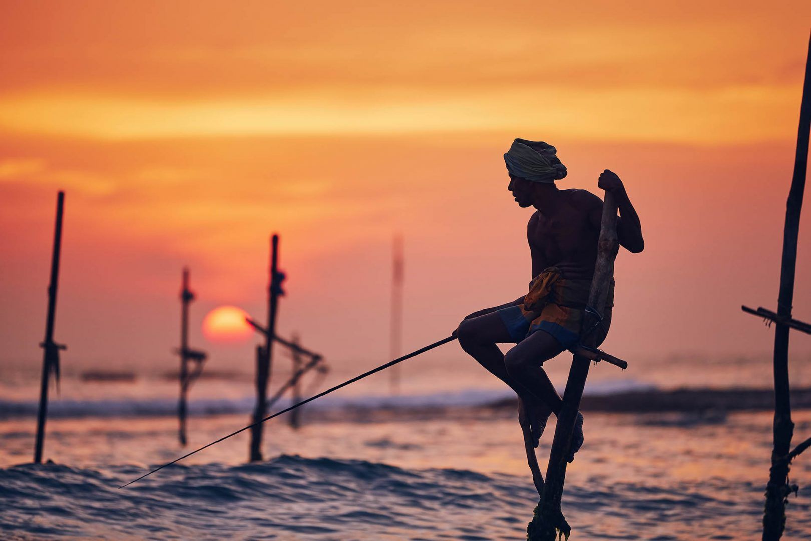 galle-stilt-fisherman-sri-lanka-shutterstock_1301477050