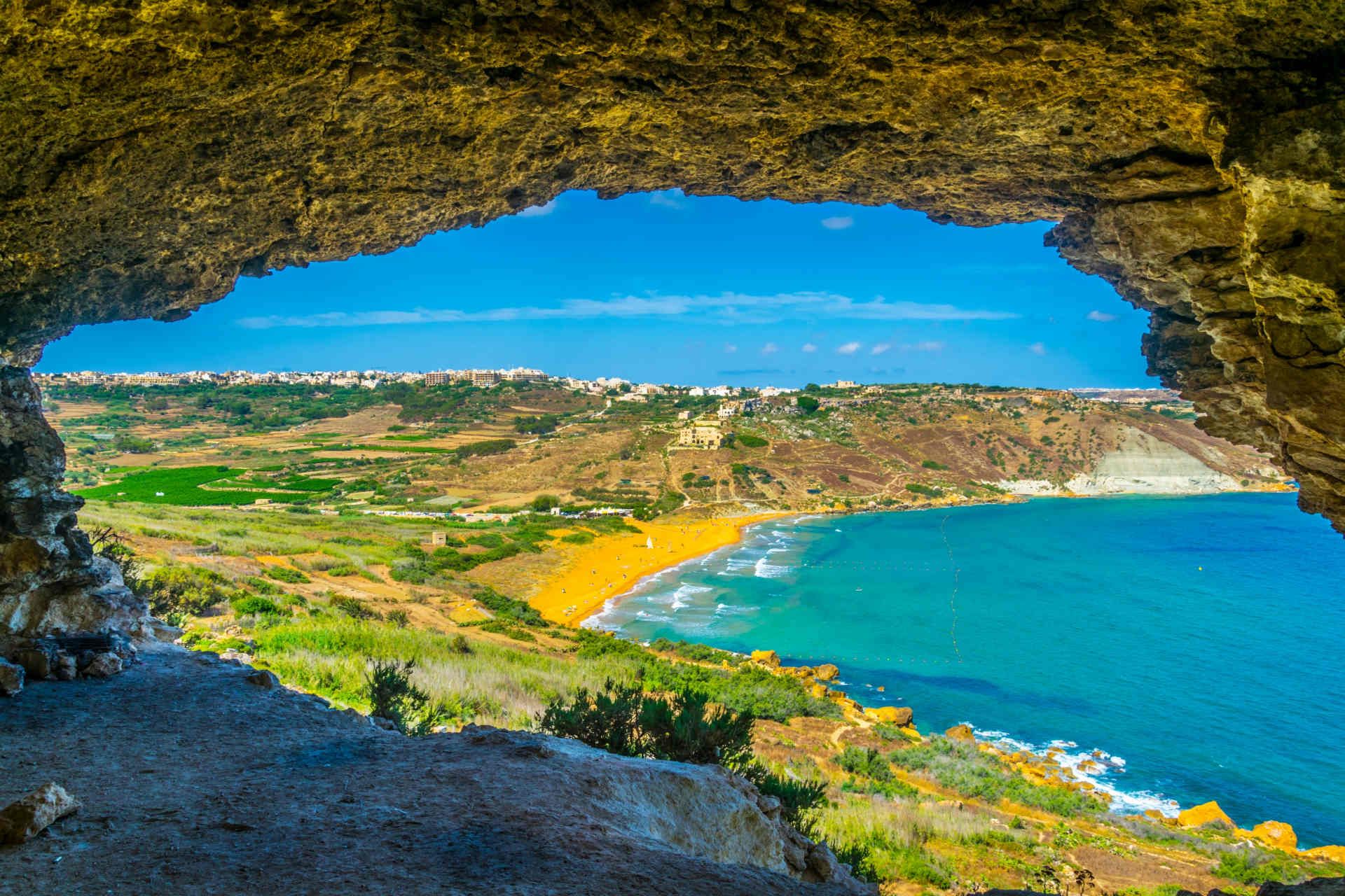 ir-ramla-bay-gozo-tal-mixta-cave-malta-shutterstock_1113124502